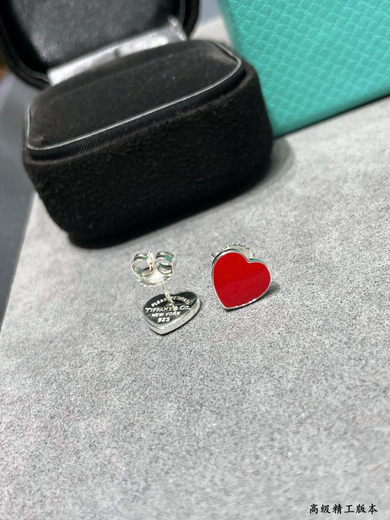 T*f*ny earrings